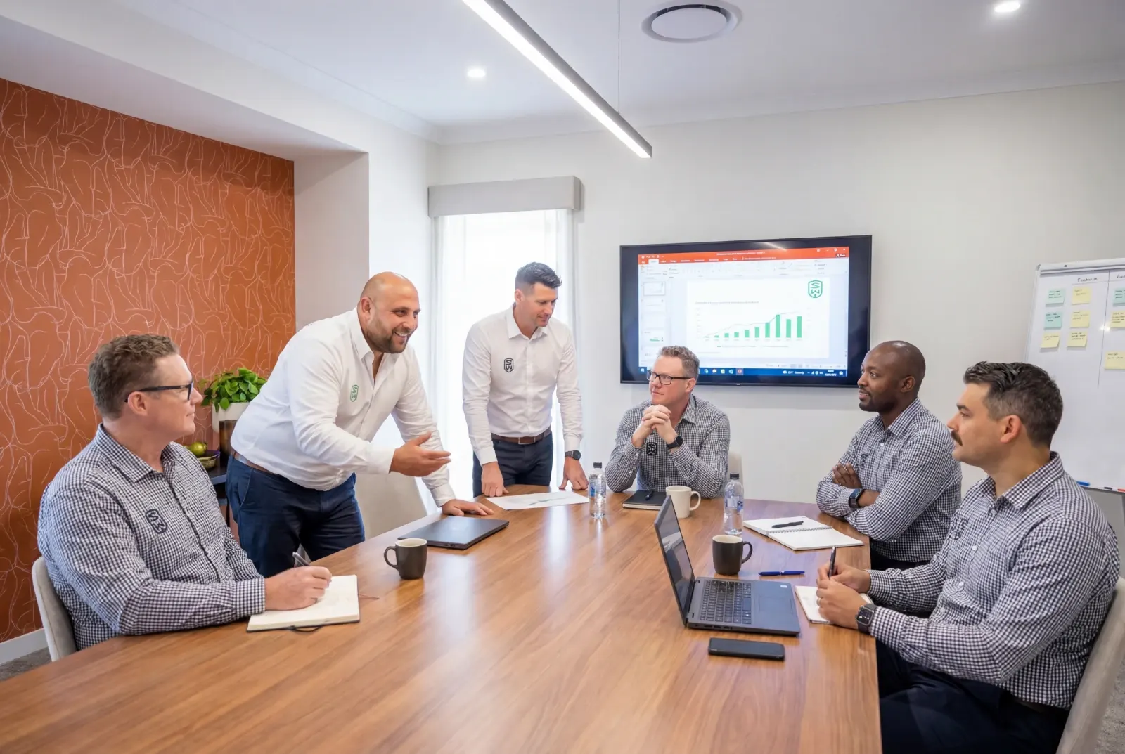 Business owner and SW Brokerage advisor discussing growth strategy